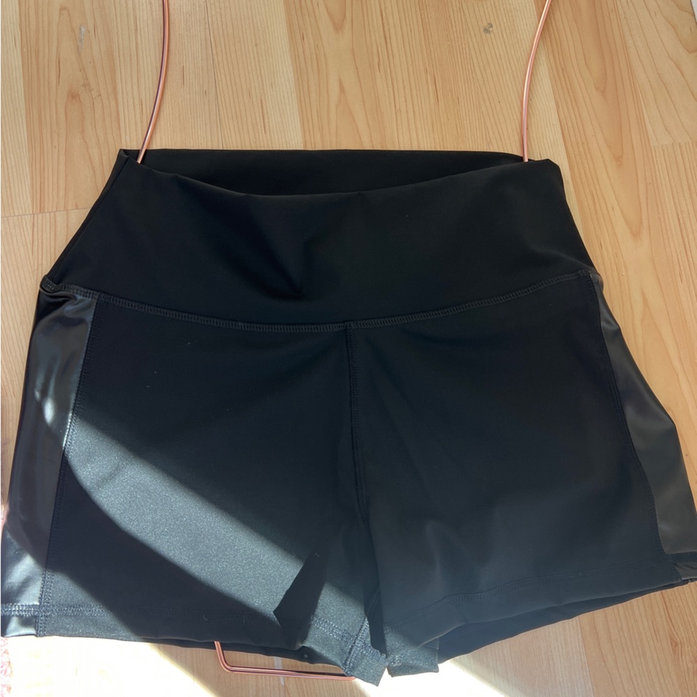 Black shorts with leather sides. Multiple sizes